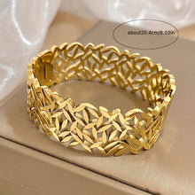 Load image into Gallery viewer, Hollow Leaves Stainless Steel Bangle bracelet
